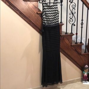 Long black fitted sheer mermaid bottom dress